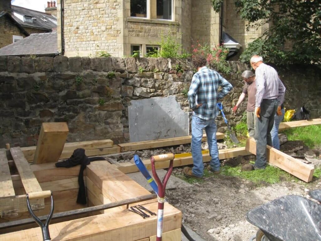 Wood for some of the beds against the wall.