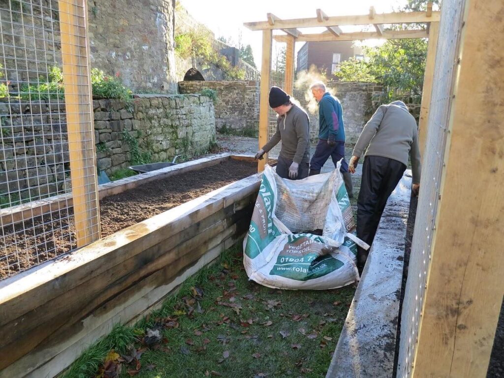 Filling the beds with earth