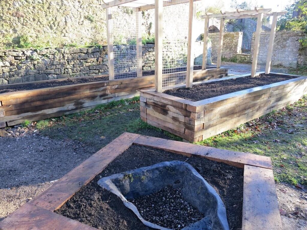 Constructing the raised beds at the Triangle