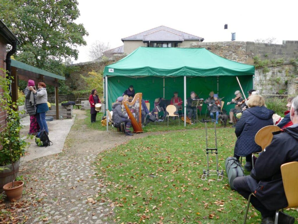 Musicians playing at the Triangle during the October 2022 music festival