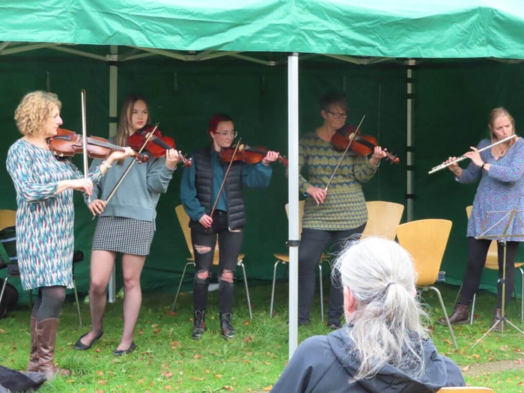 Musicians playing at the Triangle during the October 2022 music festival