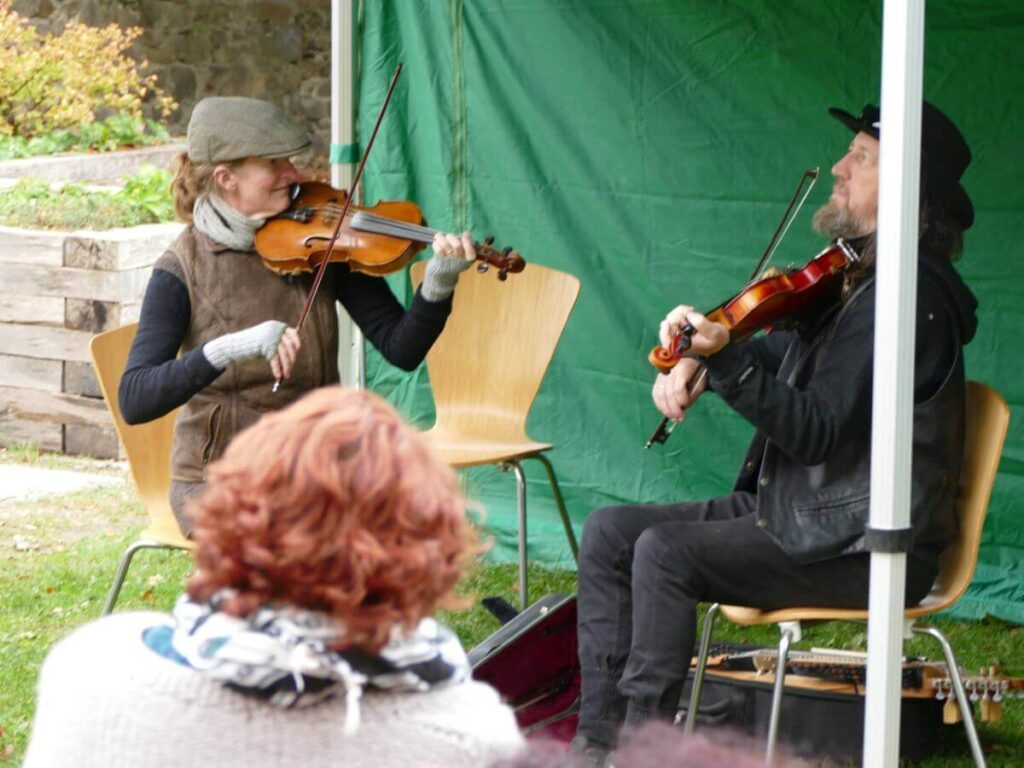 Musicians playing at the Triangle during the October 2022 music festival