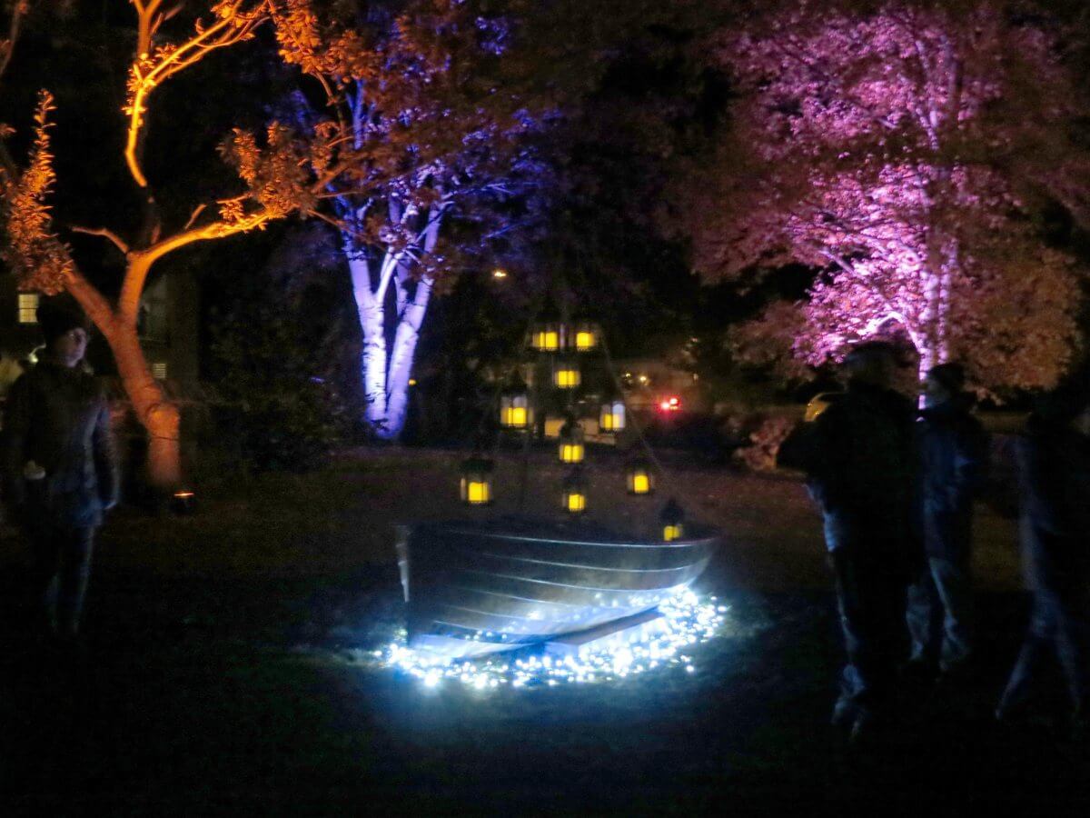 The Triangle at night lit up with coloured lights and lanterns