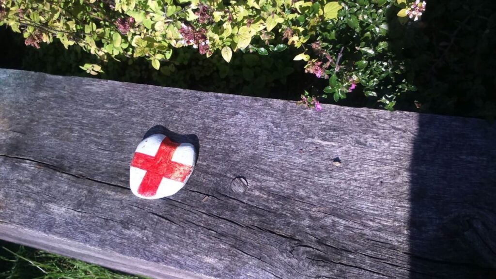 One of the painted stones left on the Triangle over the last year