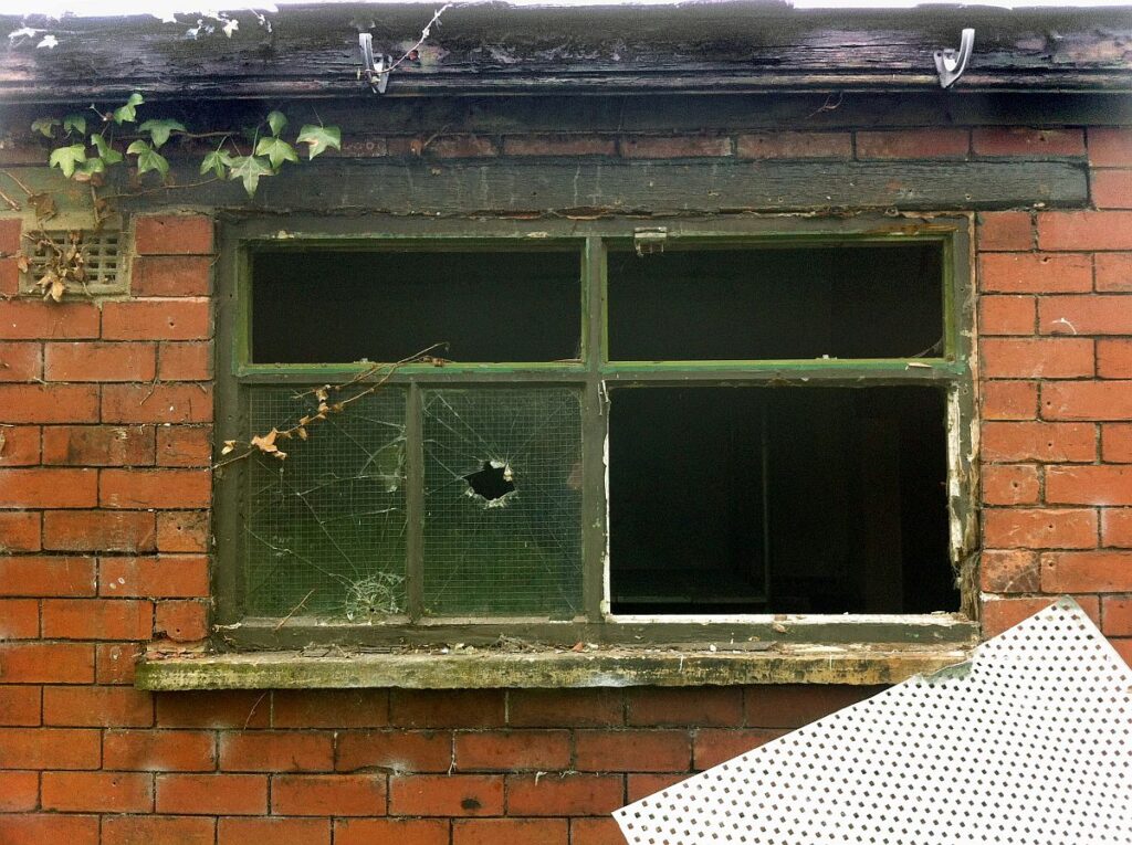 The workshop's broken window