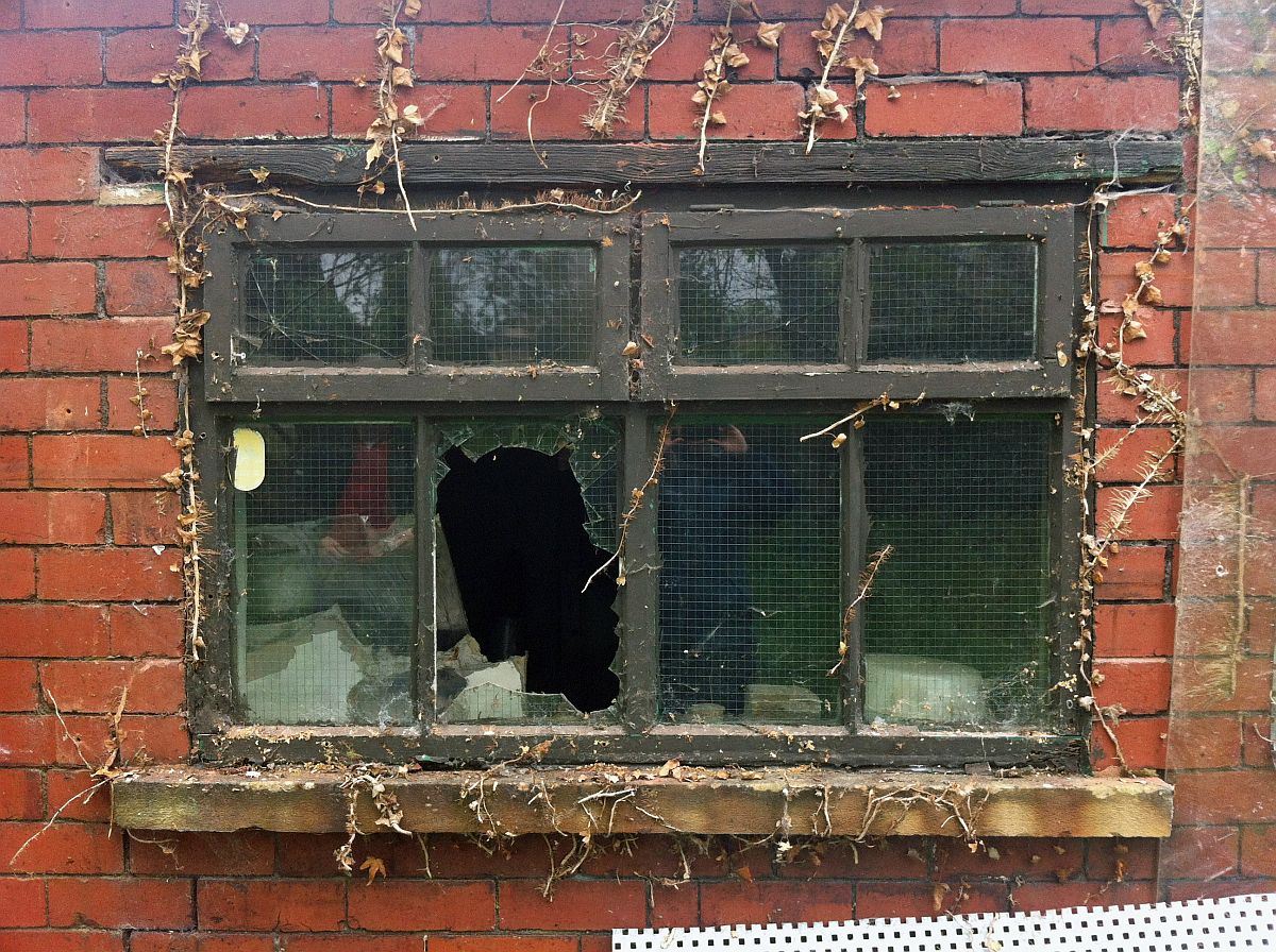 The workshop's other broken window