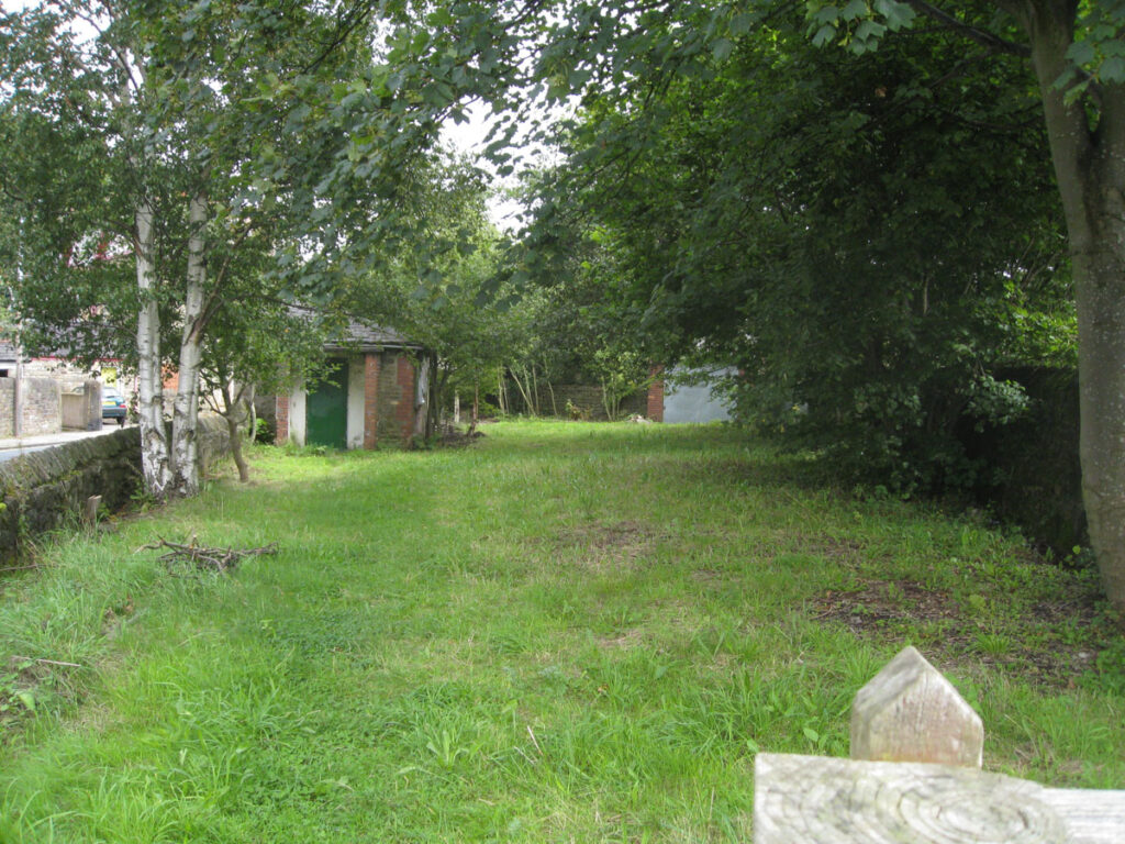 View from the gate after grass has been cut and tidied