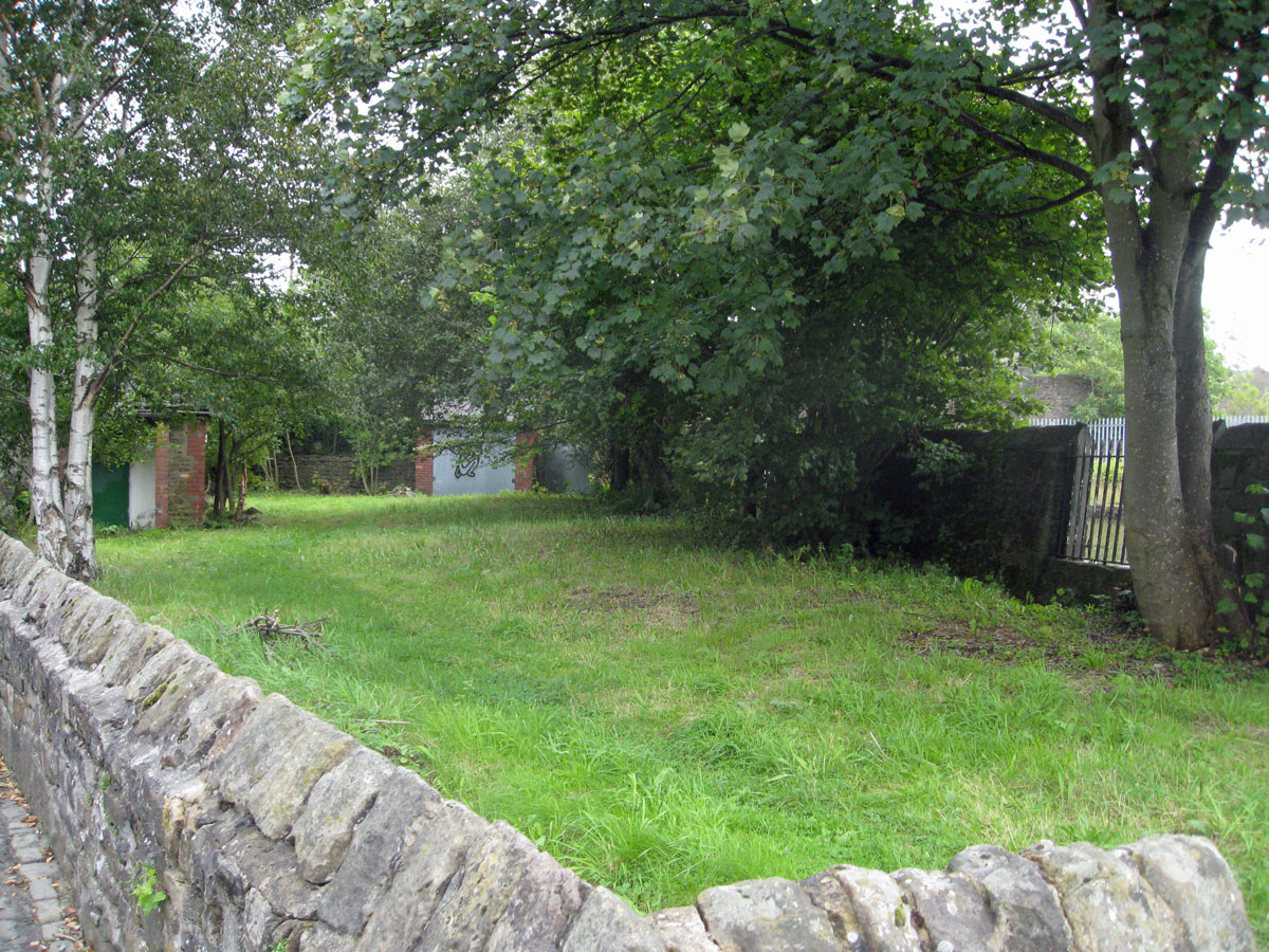 View over the wall of a much tidier triangle