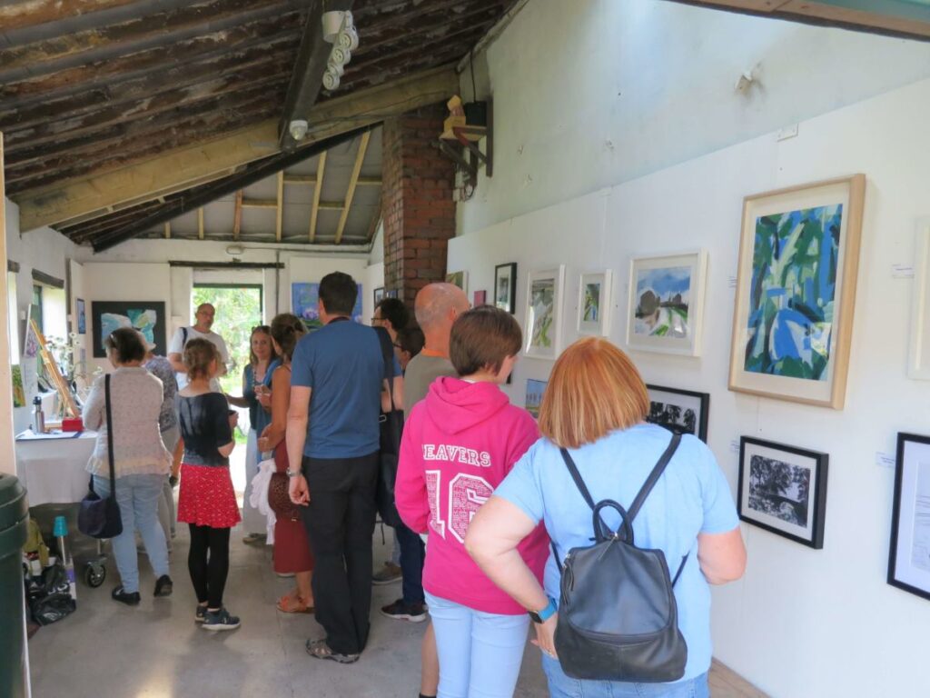 People attending the Triangle Art Exhibition, August 2019 