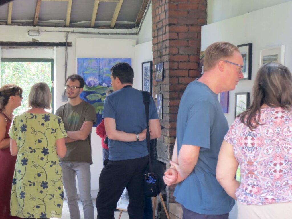 People attending the Triangle Art Exhibition, August 2019 