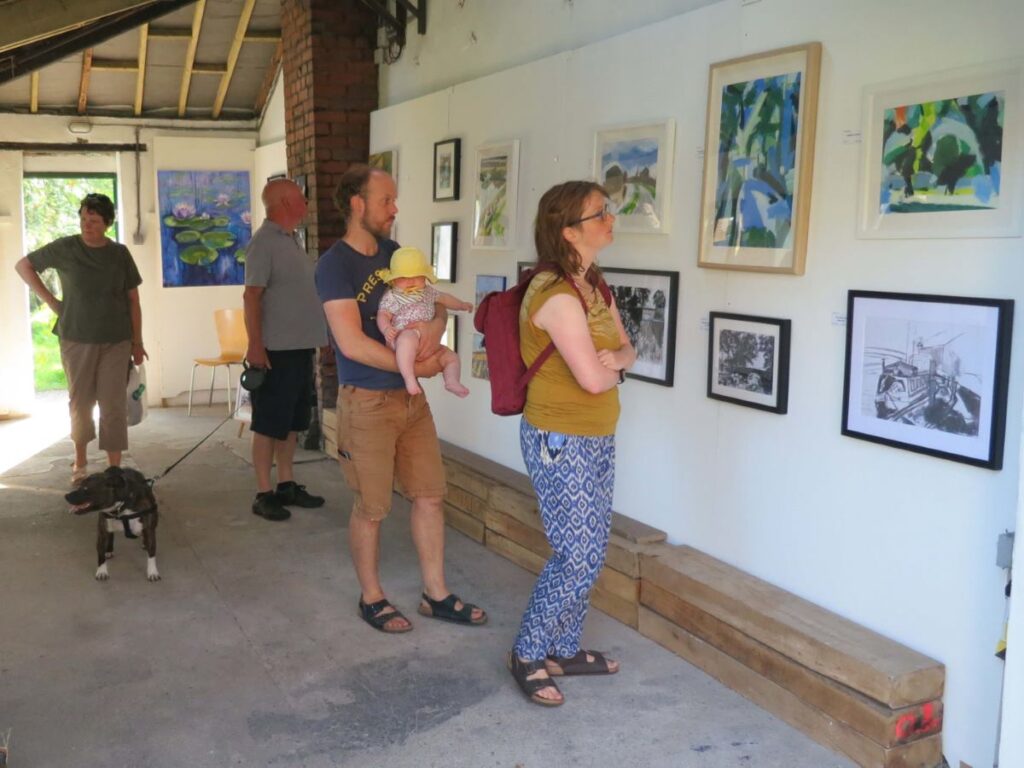 People attending the Triangle Art Exhibition, August 2019 