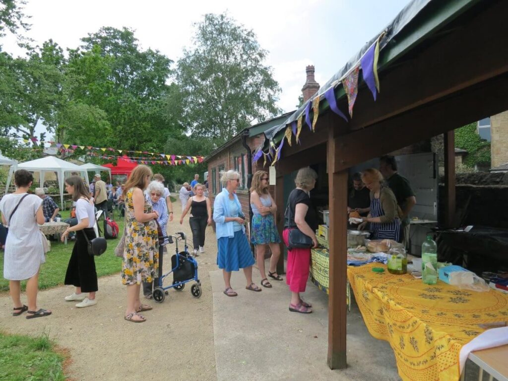 Scene with people attending the Spring Fair at the Triangle