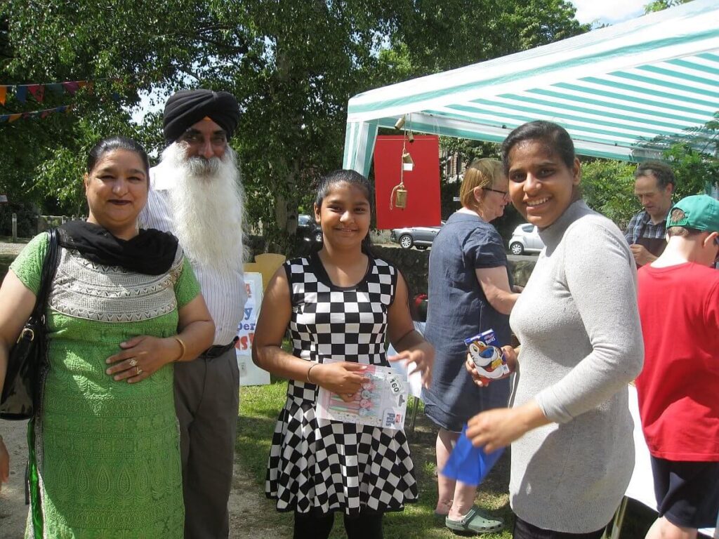 Scene with people attending the Spring Fair at the Triangle