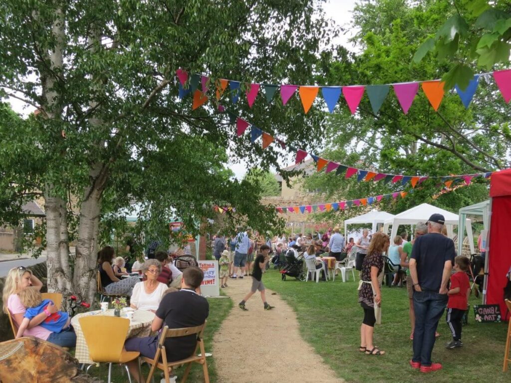 Scene with people attending the Spring Fair at the Triangle