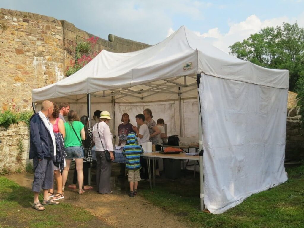 Scene with people attending the Spring Fair at the Triangle