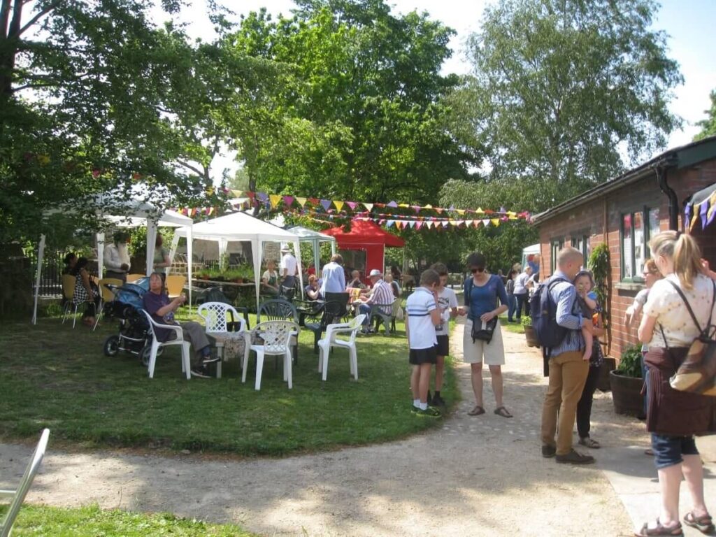 Scene with people attending the Spring Fair at the Triangle