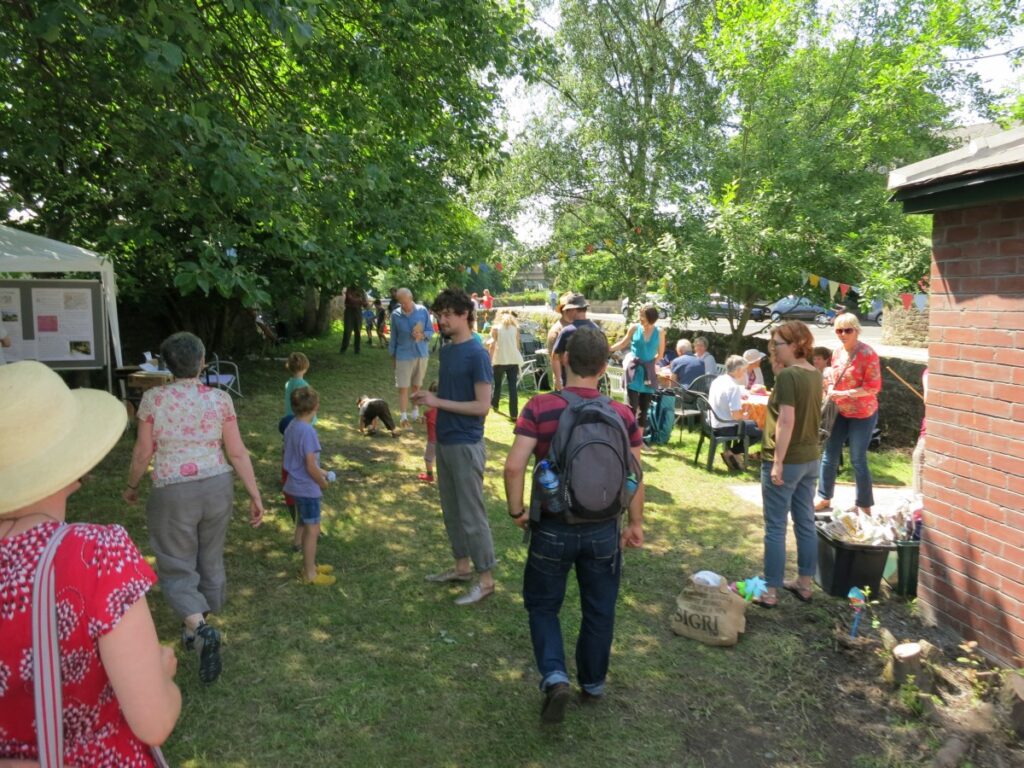 People attending the summer fair at the Triangle