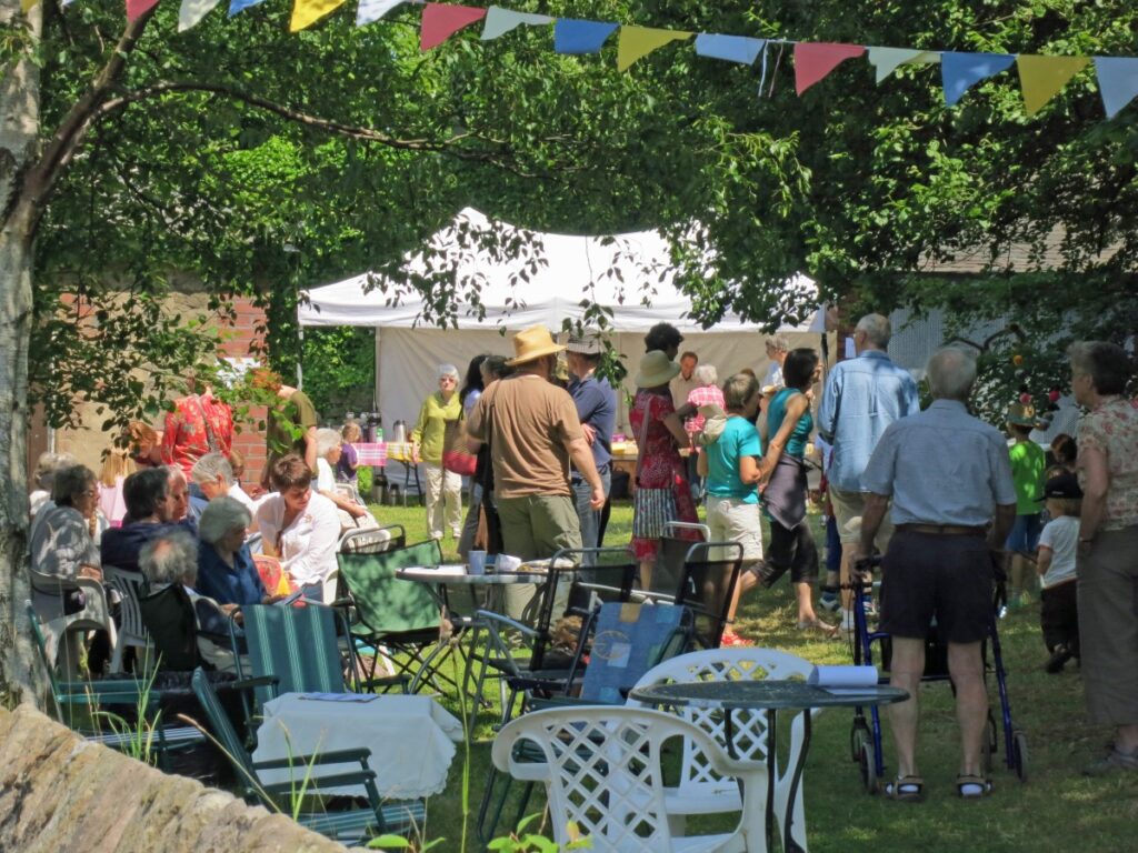 People attending the summer fair at the Triangle