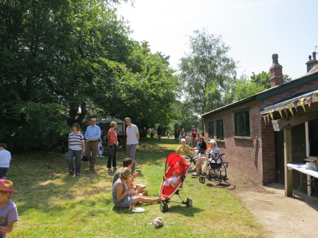 People attending the summer fair at the Triangle