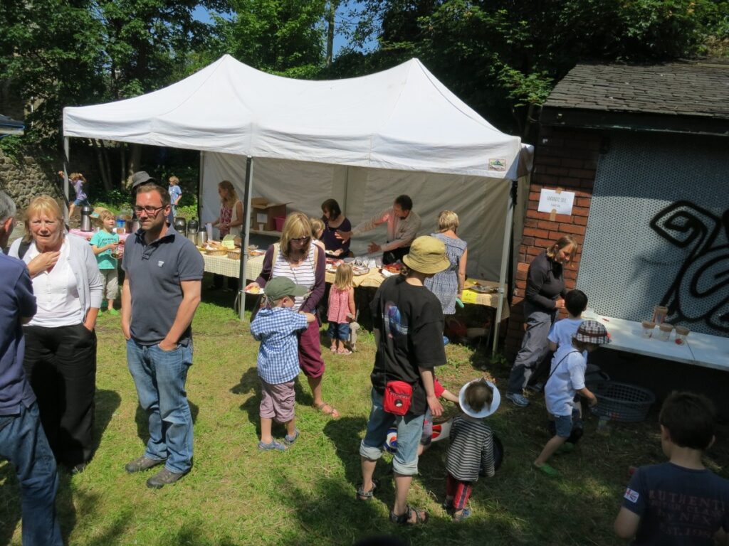 People attending the summer fair at the Triangle