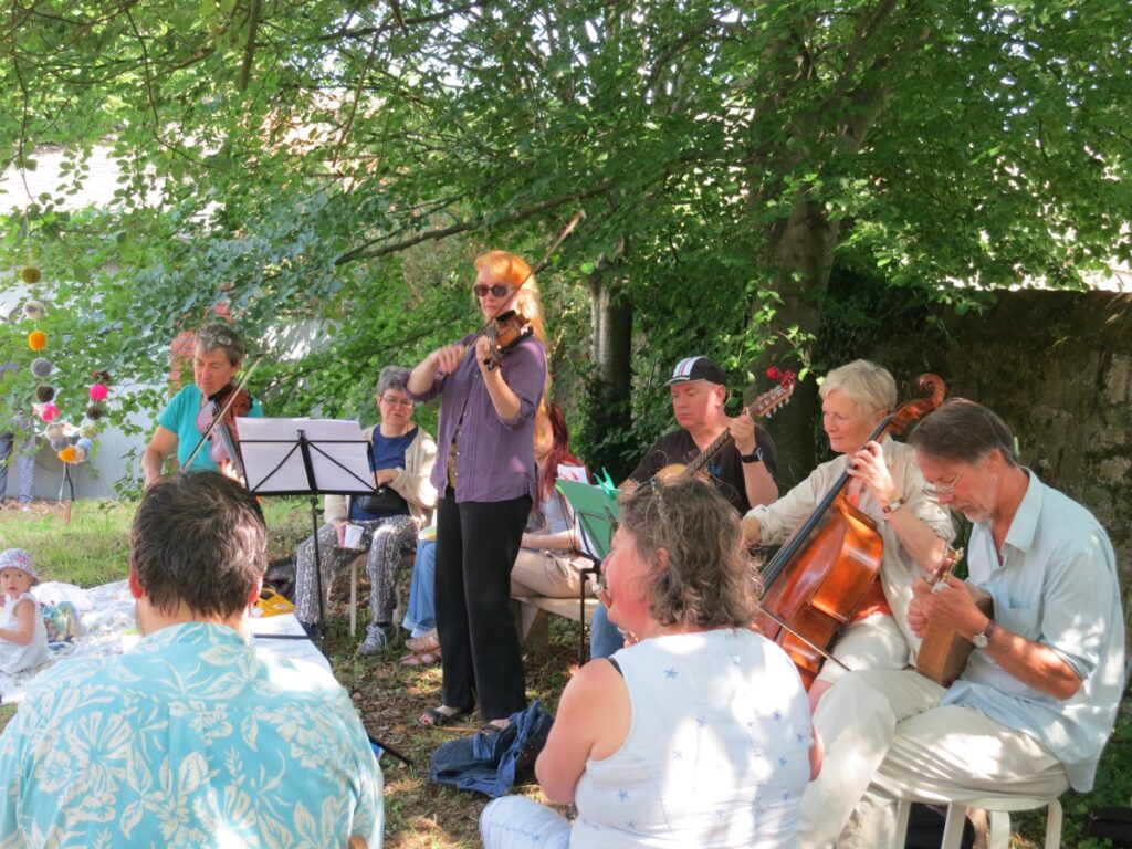 People attending the summer fair at the Triangle