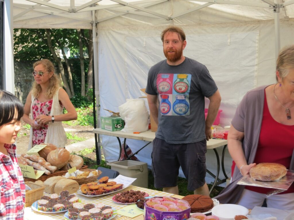 People attending the summer fair at the Triangle