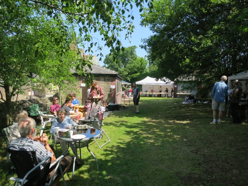 People attending the summer fair at the Triangle