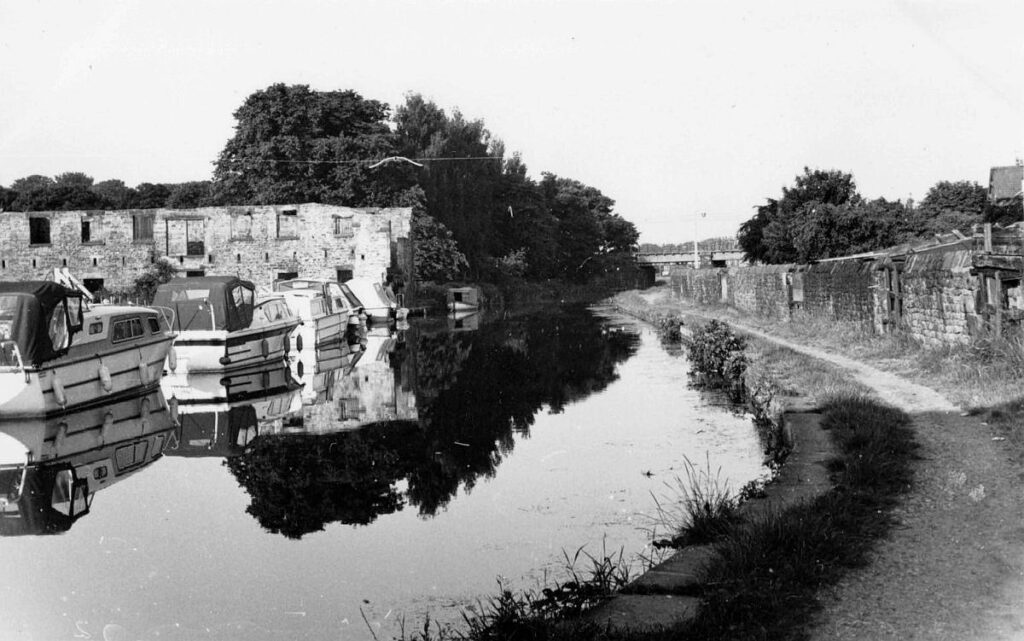 View of canal and towpath near triangle from 1960