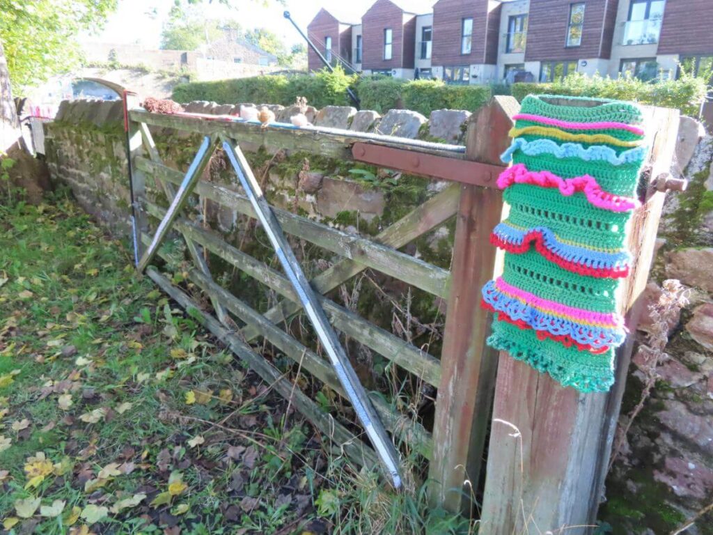 Knitted handiwork fastened to different parts of the Triangle