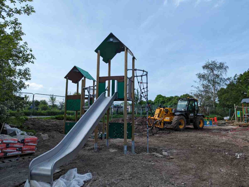 The new slide on site with a digger in the background