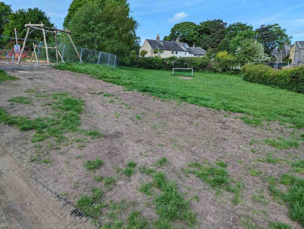 the approach to the playground with builders fences up